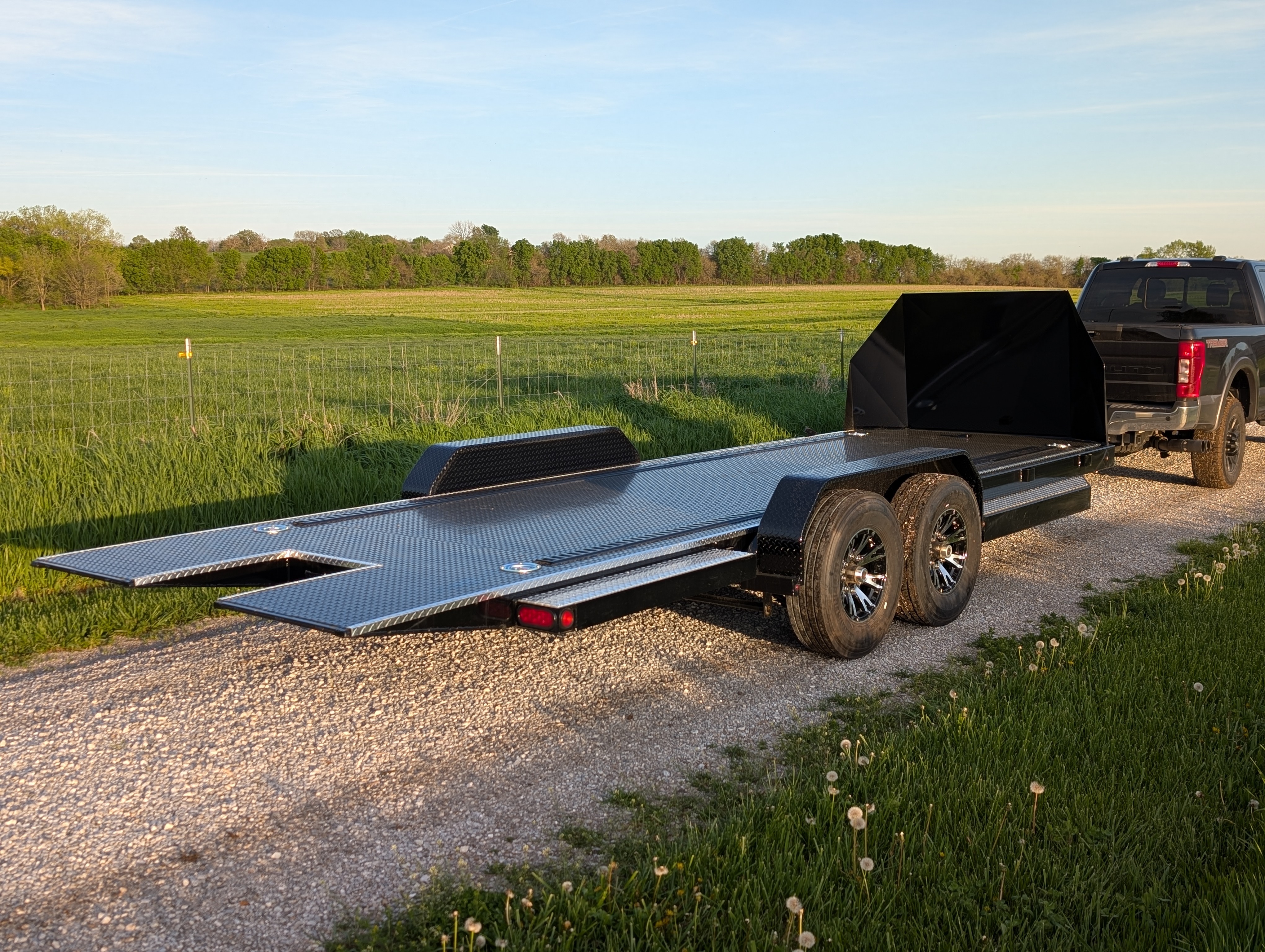 Texoma Terminator car hauler trailer in a field